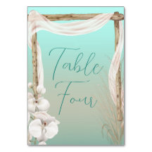 Orchids & Boho Arch på Beach Wedding