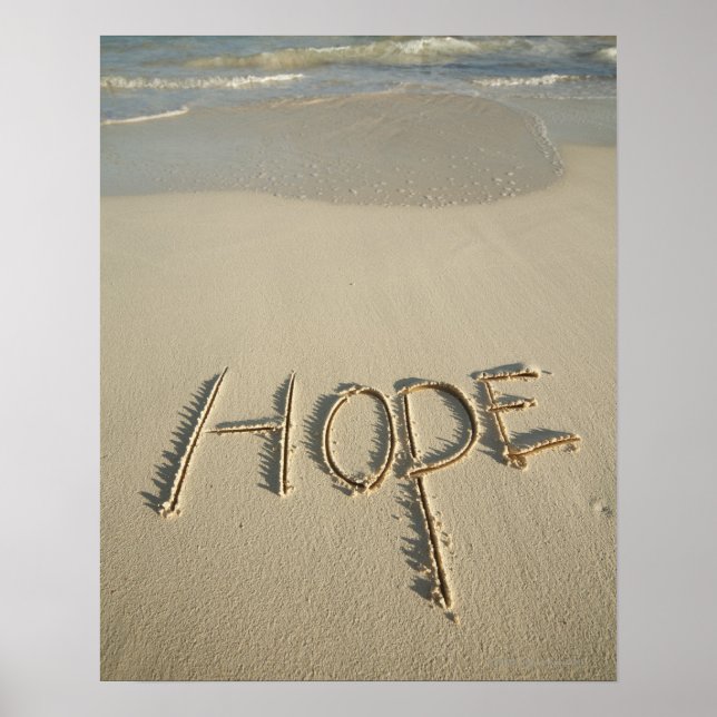 Ord "Hope"-sand som skrevs på stranden med Poster (Framsidan)