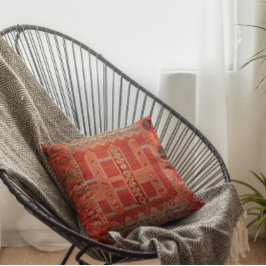 Oriental matta-design i klara orangar kudde