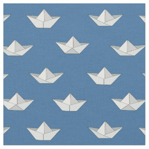 Origami fartyg på vattenmönster tyg