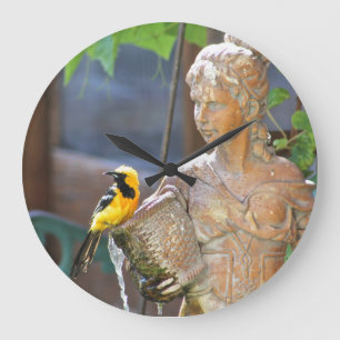 Oriole tar tid på stor klocka