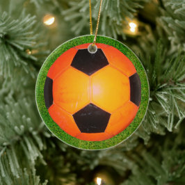Ornament för orange och svart fotbollar