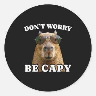 Oroa dig var capy rolig capybara runt klistermärke