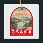 Osaka Japan Mount Fuji Travel Art Emblem Julgransprydnad Keramik<br><div class="desc">Färgdesign för Osaka-retro-vektor. Det är känt för sin moderna arkitektur,  nattliv och hjärtliga gatumat. 1600-talets shogunate Osaka Castle,  som har genomgått flera reparationer,  är dess viktigaste historiska landmärke.</div>