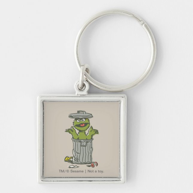 Oscar den Grinare Vintage Fyrkantig Silverfärgad Nyckelring (Framsidan)