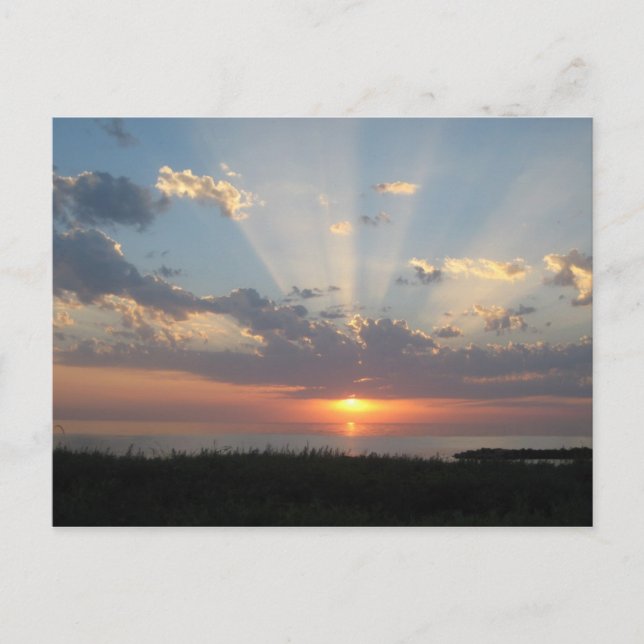 Östersjösolnedgång med ljusstrålar vykort (Framsida)