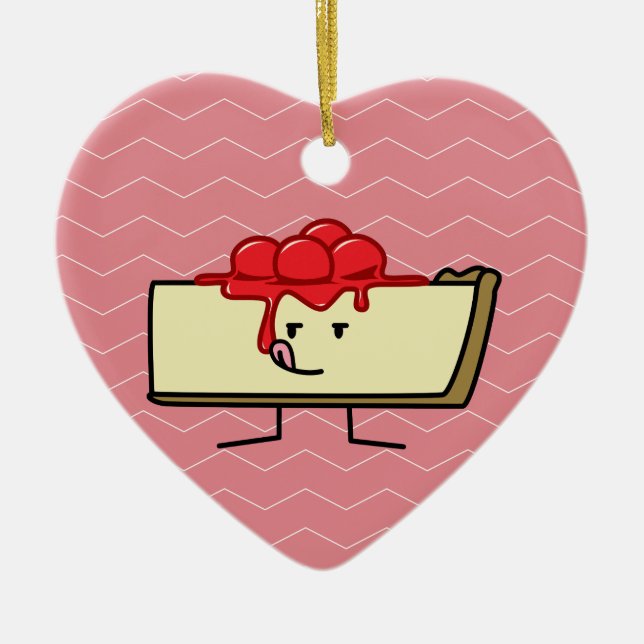 Ostkaka som slickar körsbär som överträffar julgransprydnad keramik (Framsidan)