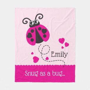 Ostört bås som en rosa för krypnamnnyckelpiga f fleecefilt