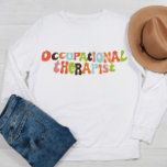OT- behandling för groovy Occupation Therapist T Shirt<br><div class="desc">Fira ditt yrke med den här groovy- och roligt-tröjan med återskrivning.</div>
