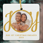 Our 1st Christmas Engaged Photo Gold Keepsake Julgransprydnad Keramik<br><div class="desc">This keepsake First Christmas Engaged photo ornament is decorated with the word JOY in gold,  stylish script typography. Easily customizable.</div>