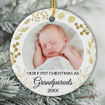 Our First Christmas As Grandparents Gold Photo Julgransprydnad Keramik<br><div class="desc">This elegant Grandparents Christmas Ornament is decorated with gold foliage on a white background.
Easily customizable with baby's photo and year.
Original Watercolor © Michele Davies.</div>