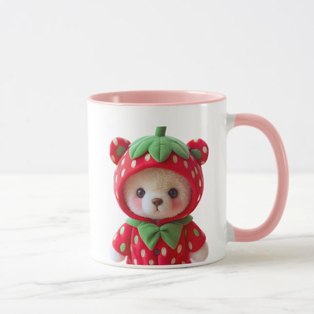 Ours en peluche avec capuche déguisé en fraise. mugg (Höger)