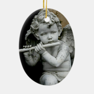 Oval prydnadCherub som leker hans flöjt Julgransprydnad Keramik
