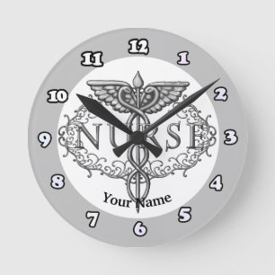 Oval silver caduceus sköterska rund klocka