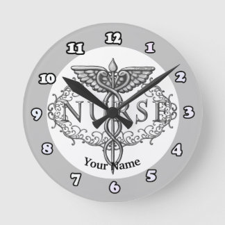 Oval silver caduceus sköterska rund klocka