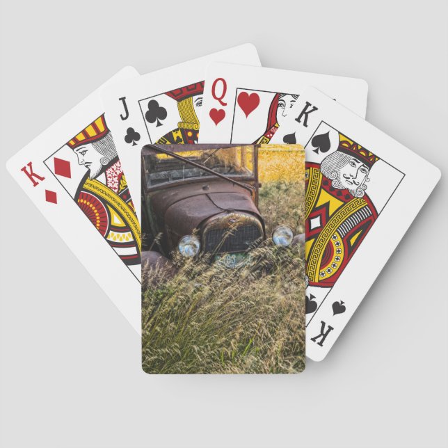 Övergiven gammal bil i högväxt gräs spel kort (Baksidan)