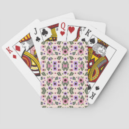 Övre bilden visar spelkort som vecklar ut sig och 