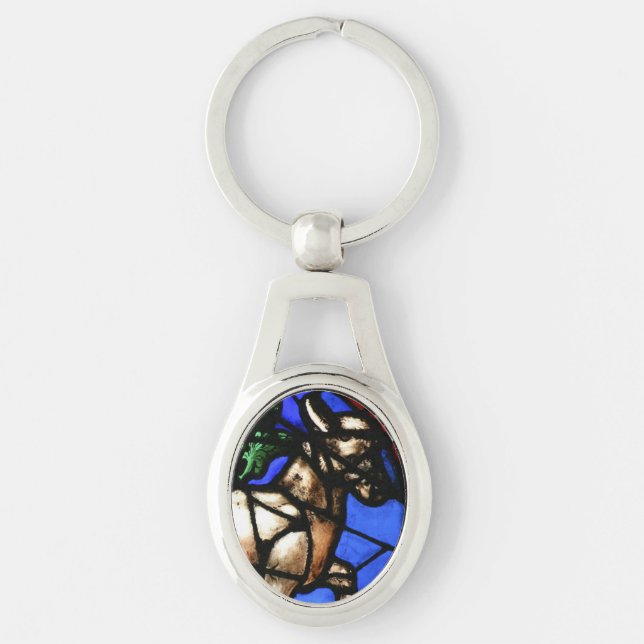 OxenZodiacmålat glass Notre Dame de Paris reko Ovalt Silverfärgad Nyckelring (Framsidan)