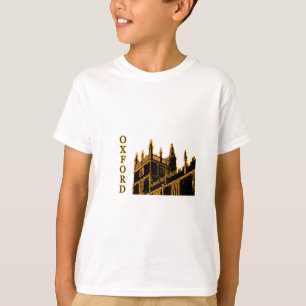 Oxford England byggnad 1986 röra sig i spiral guld Tee