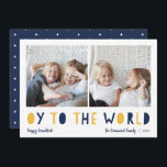 Oy to the World | 2 Foto Hanukkah Julkort<br><div class="desc">Det vita Hanukkah-fotokortet har två av dina favoritfoton i en familj i fyrkantigt format som är placerade sida vid sida. "Oy to the World" visas under i blått och gyllene gult. Anpassa till din familj namn eller namn, anpassningsbar hälsning och året längs grund. Ett lustigt och modernt Hanukkah-kort designat för...</div>