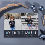 Oy to the World | Hanukkah-fotokort Julkort<br><div class="desc">Det vita Hanukkah-fotokortet har två av dina favoritfoton i en familj i fyrkantigt format som är placerade sida vid sida. "Oy to the World" visas under i blått och vitt utskrivet. Anpassa till din familj namn eller namn, anpassningsbar hälsning och året längs grund. Kort på blå rand vid en mönster...</div>