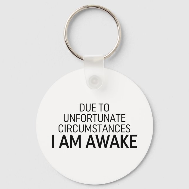 På grund av olyckliga omständigheter är jag vaken nyckelring (Framsida)