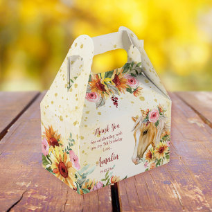 Palominohäst med solblommor och rosa blommor presentaskar