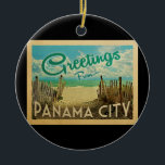 Panama City Beach Vintage resor Julgransprydnad Keramik<br><div class="desc">I den här vintagen i Hälsning från Panama City finns en sandstrand med vackra turkoshavet vatten och över havet,  ett blå himmel med giftiga vita moln. I vintage resor stil.</div>