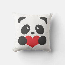 Panda med en hjärtkudde kudde