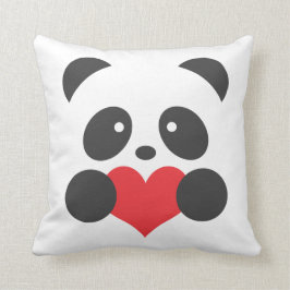 Panda med en hjärtkudde kudde