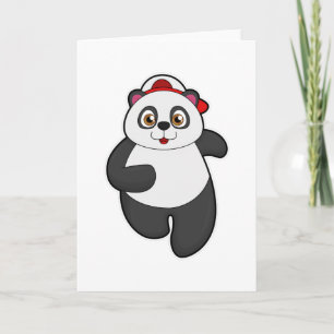 Panda som springer med mössa kort