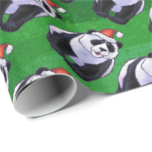 Pandabjörn i den Santa hatten på grönt Presentpapper