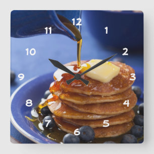 Pannkakor med sirap och blåbäret fyrkantig klocka