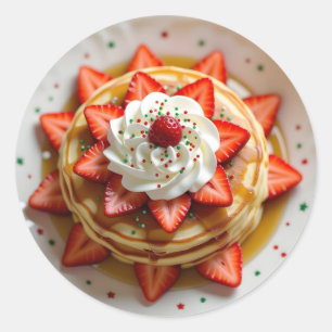 Pannkakor med vispad grädde och julglitter runt klistermärke