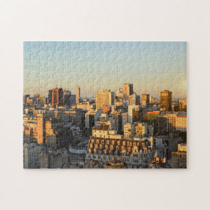 Panorama- beskåda av Cityscape på skymningen Pussel