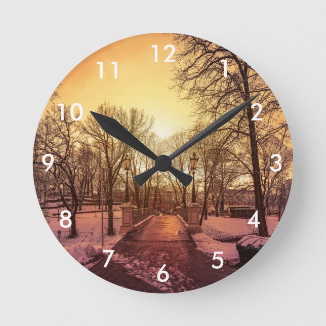 Panoramisk syn på snöparken under solnedgången i R Rund Klocka (Framsida)