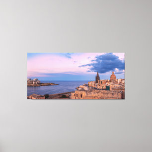 Panoramisk syn på solnedgång över Valletta Canvastryck
