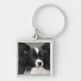 papillon-17.jpg fyrkantig silverfärgad nyckelring