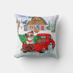 Papillon hund i jul leveransbil snö kudde
