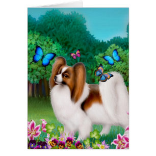 Papillon hund i trädgårdträdgård hälsningskort