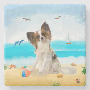 Papillon Hund på Beach Stenunderlägg