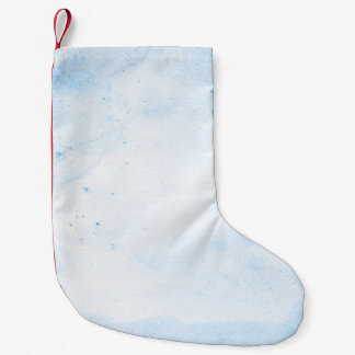Papper bakgrundsblå vattenfärg liten julstrumpa