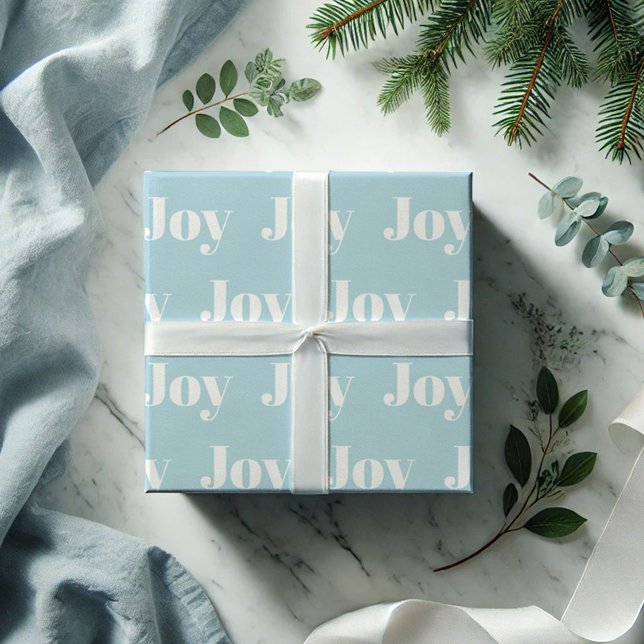 Papper Joy Typografi för radbrytning av blå Helgda Presentpapper (Christmas wrapping paper blue Joy pattern)