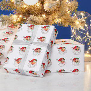 Papper omslagning av ansikte i schaktfull Santa Presentpapper