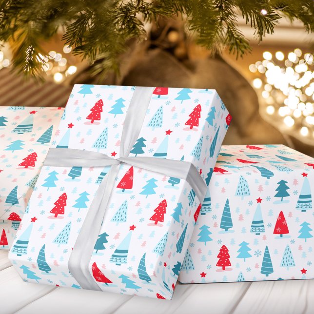 papper omslagning av blått rosa i julgranar presentpapper (Christmas trees blue red pink wrapping paper)