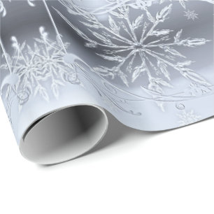 papper omslagning av snöflingor i silver presentpapper