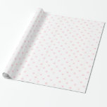papper radbrytning av rosa polka-punkt presentpapper<br><div class="desc">Ljus rosa polkpunktsomslagning papper</div>