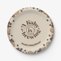 Pappersfat med tema kaffe och 'En baby bryggs'