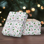 Pappra julafton Mönster Presentpapper<br><div class="desc">En papper omslutning med en juldesign som omfattar candy cane,  Julgran,  krans,  holly,  träd,  stjärnor och polka dots. Perfekt för inslagning av gåvor till dina klienter eller till din familj och dina vänner i slutet av året i firande!</div>