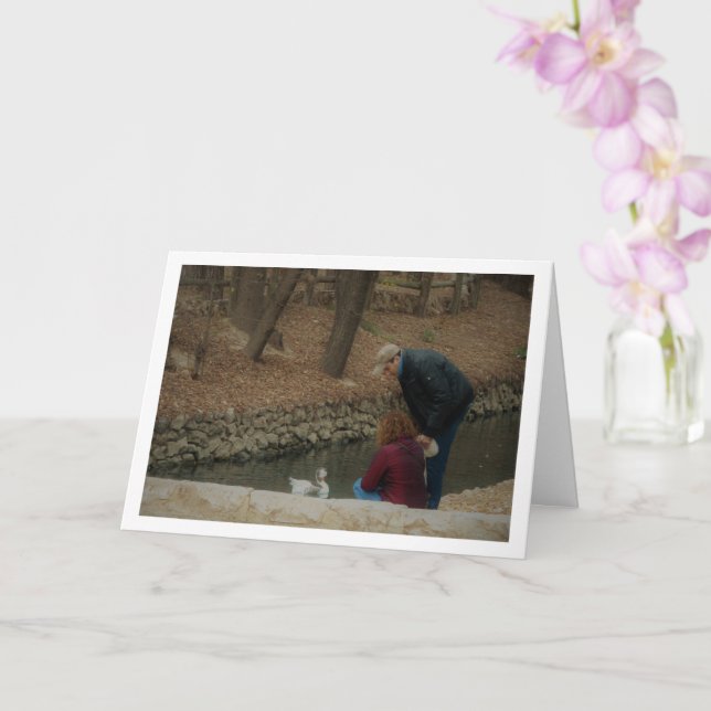 Par som matar anka i San Vicente Park Kort (Orkide)